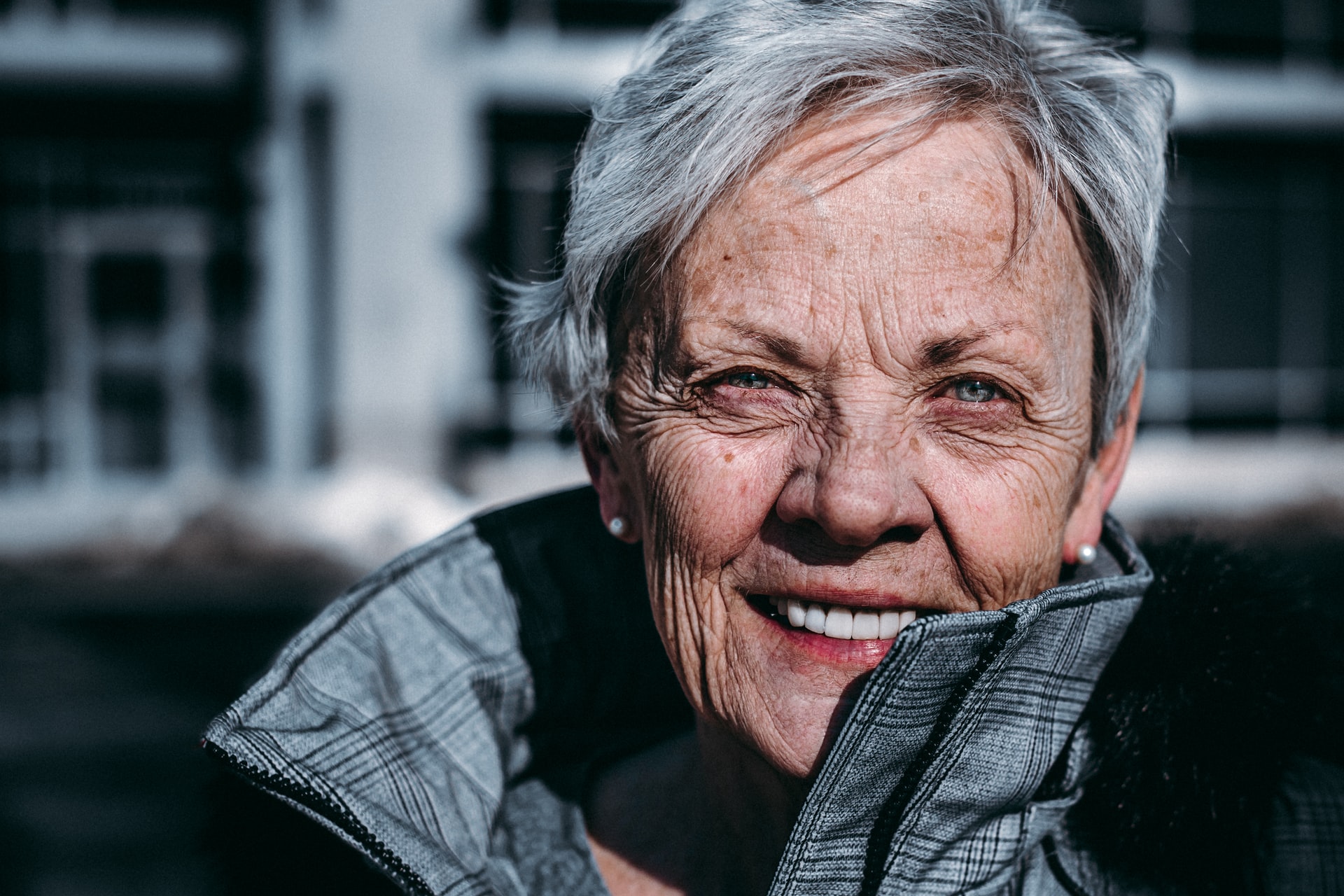 Lady with gray hair smiling