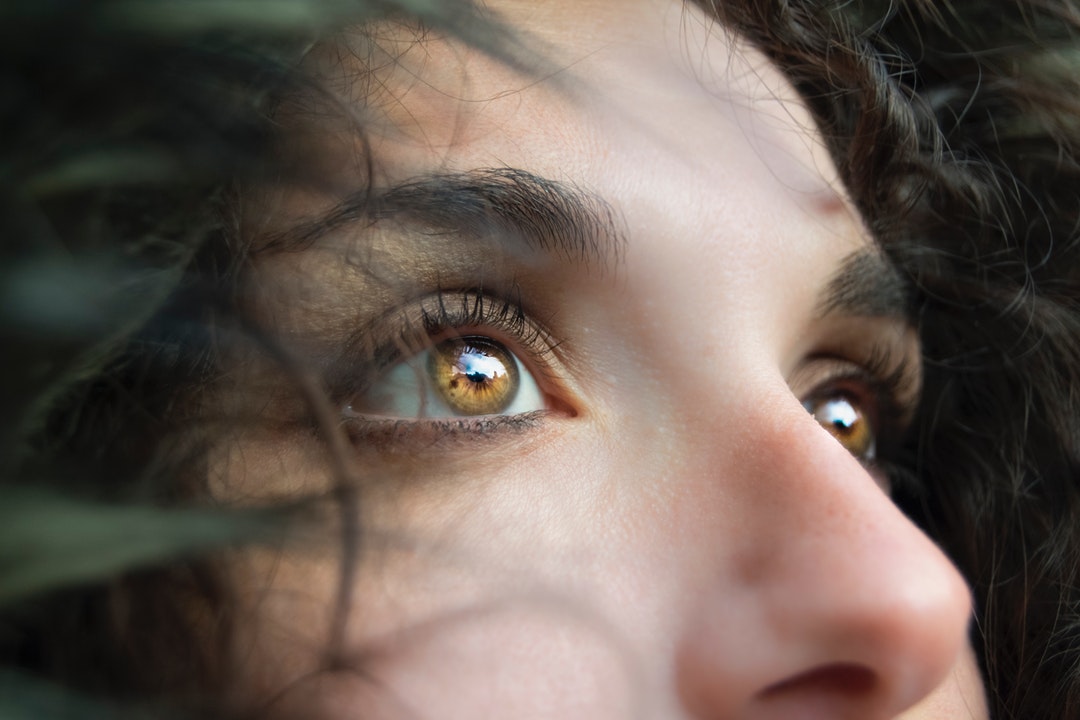 woman with dark hair and brown eyes